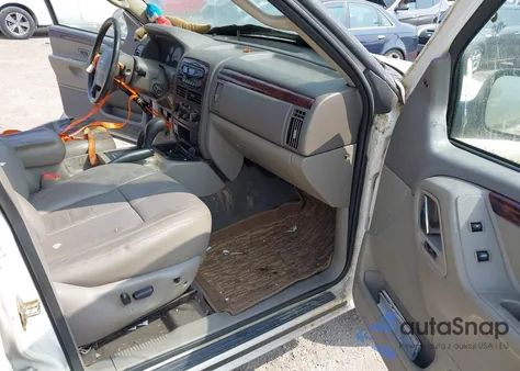 2004 Jeep Grand Cherokee Limited z USA, uszkodzony, nr VIN 1J4GW58N14C380393